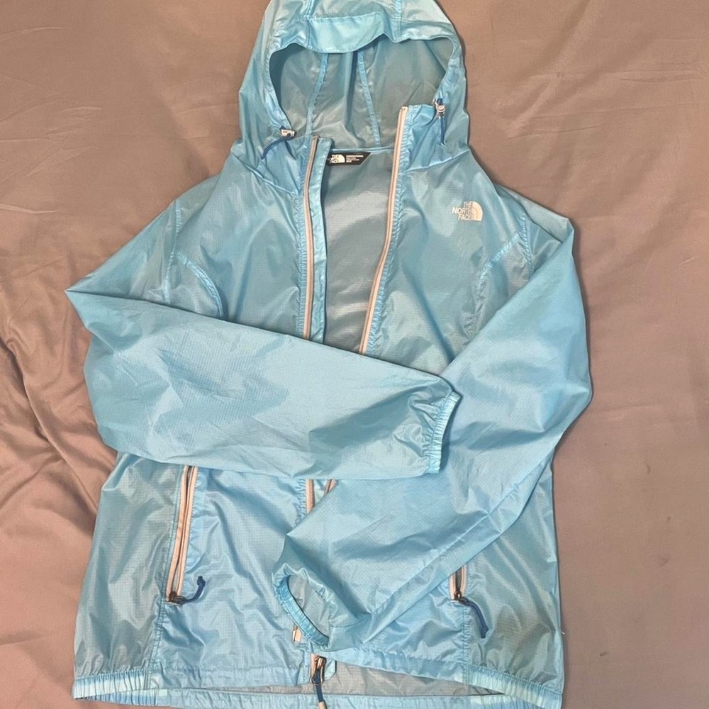 The North Face women’s teal water resistant coat